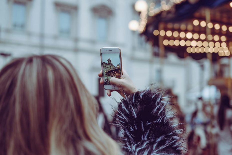 woman holding iphone